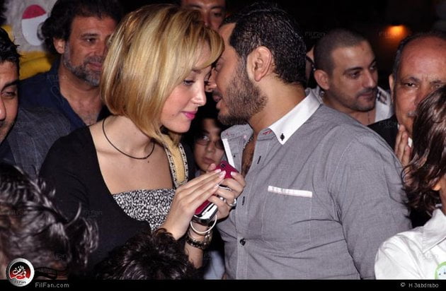 صور تامر حسنى وزوجتة بسمة بوسيل